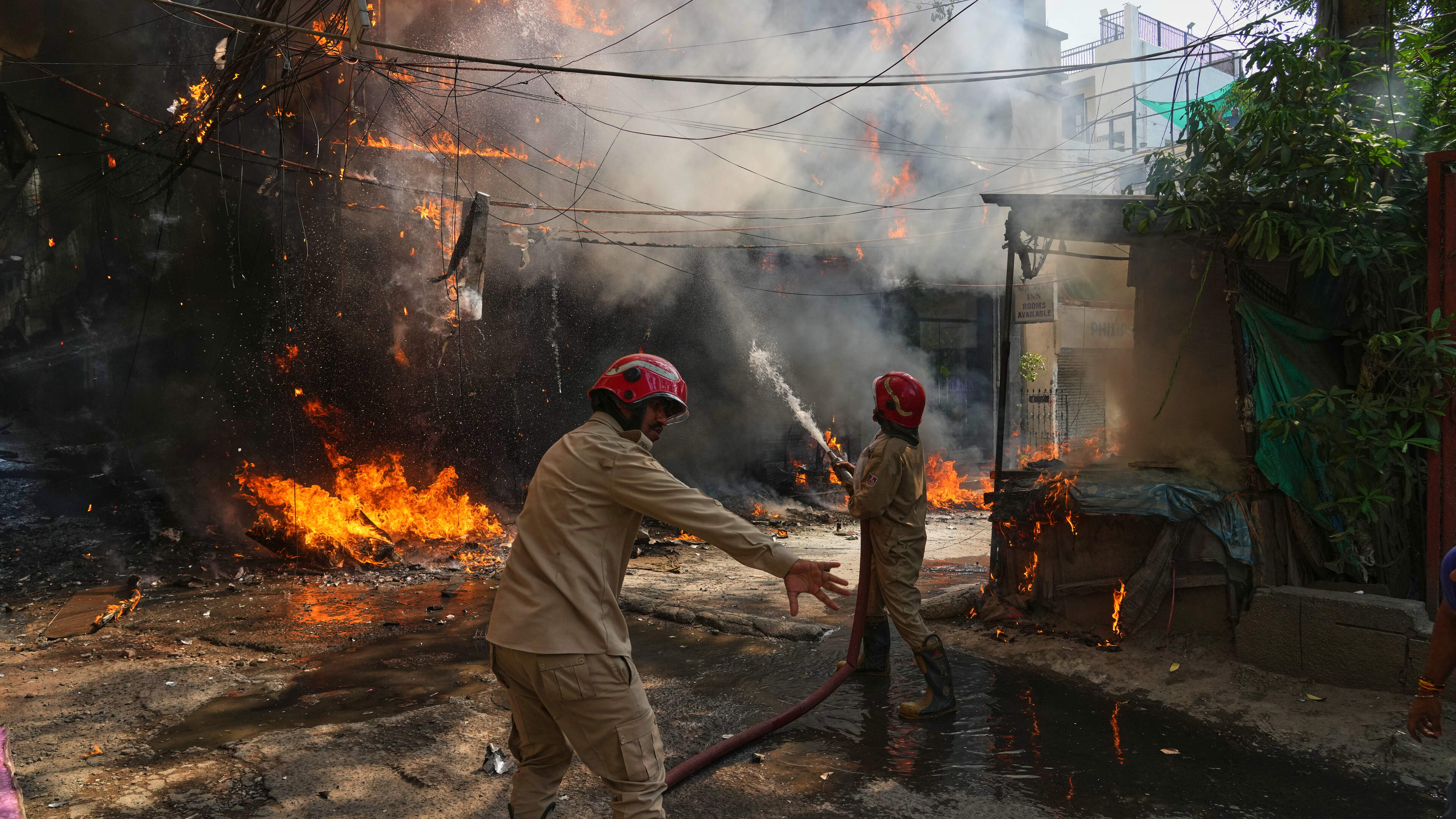 Twelve foreign nationals among 21 killed as fire rips through Delhi hotel